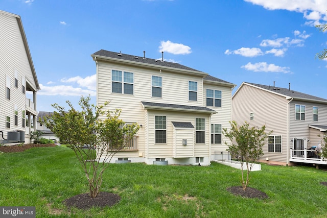 42694 Chisholm, Broadlands, VA 20148 - back of house with cooling unit and a lawn