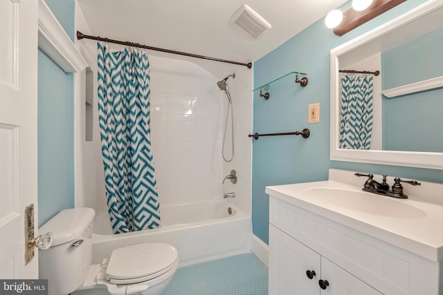 bathroom with toilet, shower / tub combo with curtain, vanity, and visible vents