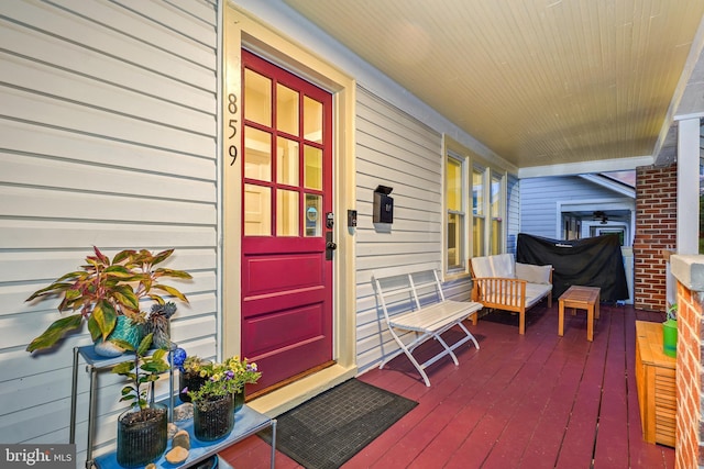 property entrance featuring covered porch