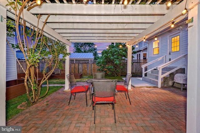 view of patio / terrace featuring a pergola, outdoor dining area, and a fenced backyard