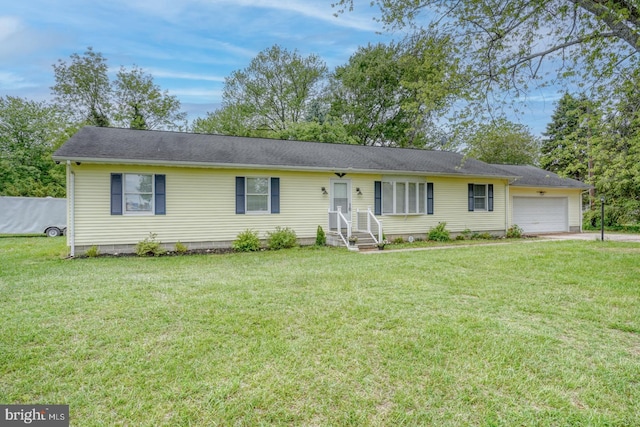 ranch-style home with a garage, a front lawn, entry steps, and driveway