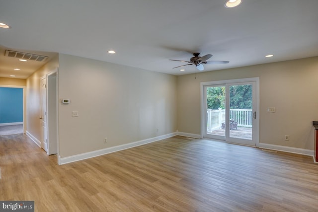 empty room with a ceiling fan, light wood-style floors, recessed lighting, and baseboards