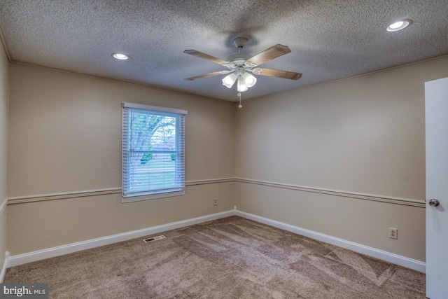 unfurnished room with carpet, a ceiling fan, baseboards, a textured ceiling, and recessed lighting