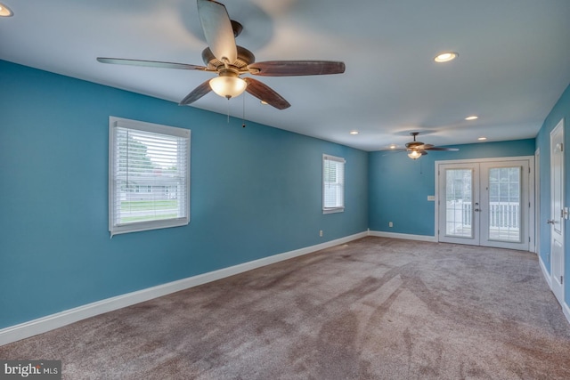 spare room featuring a ceiling fan, recessed lighting, baseboards, and carpet