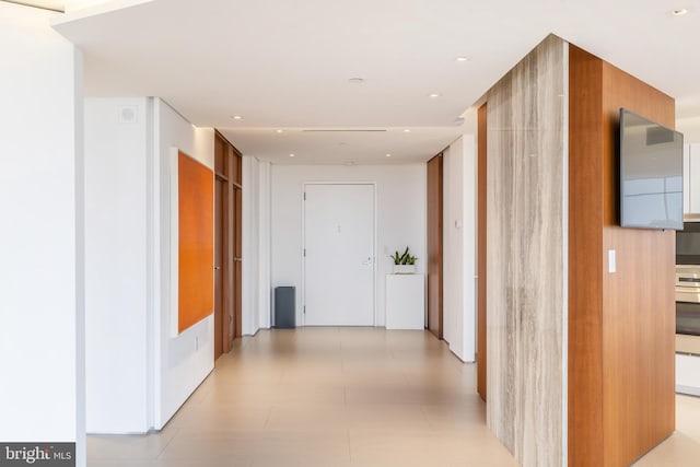 corridor with recessed lighting