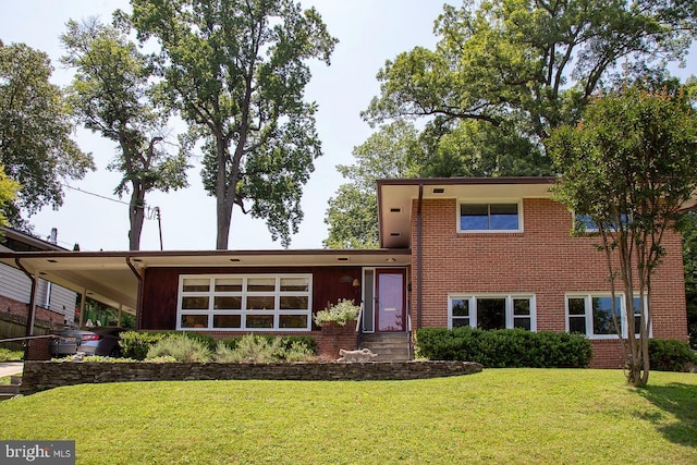3217 Pauline Dr, Chevy Chase, MD 20815 - tri-level home featuring brick siding and a front yard