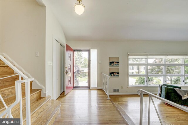 3217 Pauline Dr, Chevy Chase, MD 20815 - foyer with plenty of natural light, light wood-style flooring, and stairs