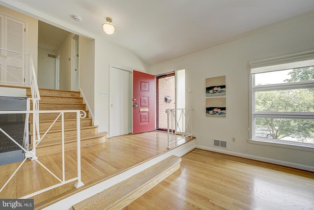 3217 Pauline Dr, Chevy Chase, MD 20815 - entrance foyer featuring wood finished floors, stairway, and lofted ceiling
