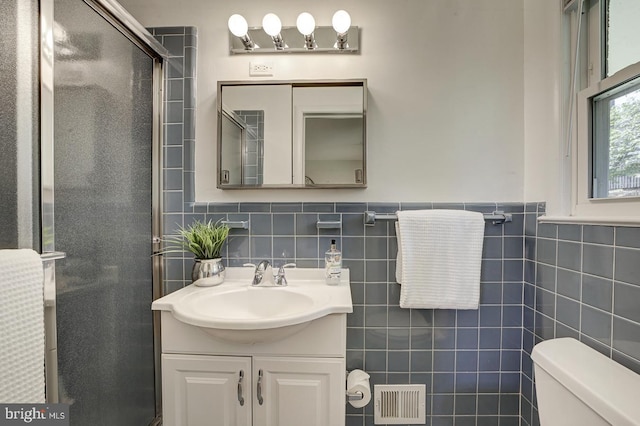 3217 Pauline Dr, Chevy Chase, MD 20815 - full bath featuring vanity, tile walls, and a stall shower