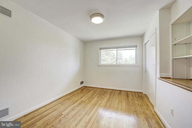 3217 Pauline Dr, Chevy Chase, MD 20815 - spare room with light wood-style flooring and baseboards