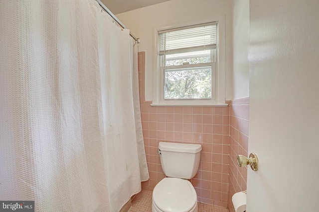 3217 Pauline Dr, Chevy Chase, MD 20815 - bathroom with tile walls, tile patterned floors, a wainscoted wall, and a shower with curtain