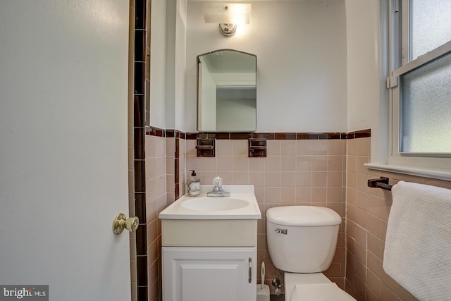 3217 Pauline Dr, Chevy Chase, MD 20815 - bathroom with vanity, tile walls, and a wainscoted wall