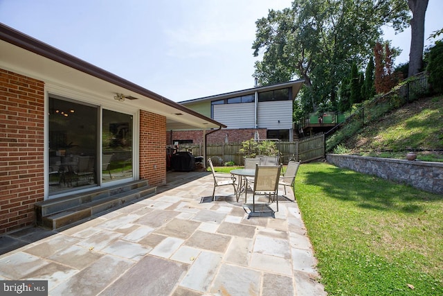 3217 Pauline Dr, Chevy Chase, MD 20815 - fenced backyard with a patio area, entry steps, and outdoor dining space