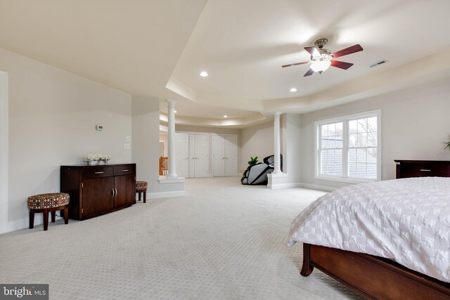 bedroom featuring recessed lighting, carpet, and ornate columns