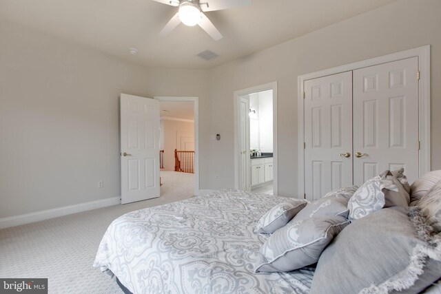 bedroom with ceiling fan, light carpet, baseboards, visible vents, and a closet