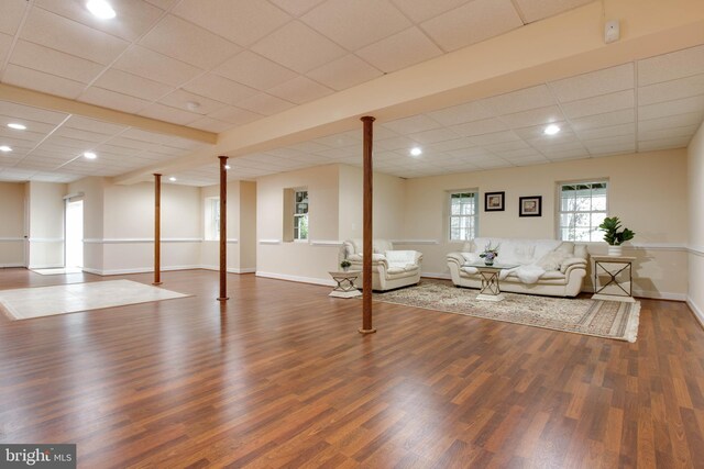 unfurnished living room featuring recessed lighting, baseboards, and wood finished floors