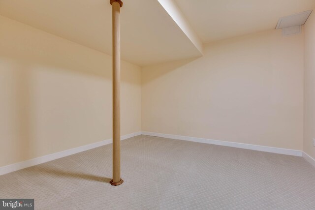 additional living space with carpet floors and baseboards