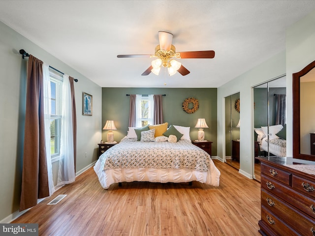 5409 Smith Creek Rd, New Market, VA 22844 - bedroom featuring visible vents, multiple closets, baseboards, and light wood-style flooring
