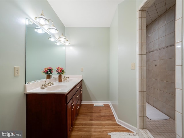 5409 Smith Creek Rd, New Market, VA 22844 - full bathroom featuring visible vents, wood finished floors, a sink, and double vanity