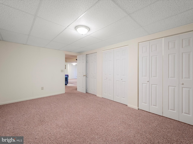 5409 Smith Creek Rd, New Market, VA 22844 - unfurnished bedroom featuring baseboards, carpet flooring, two closets, and a drop ceiling