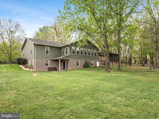 5409 Smith Creek Rd, New Market, VA 22844 - back of property with brick siding and a yard