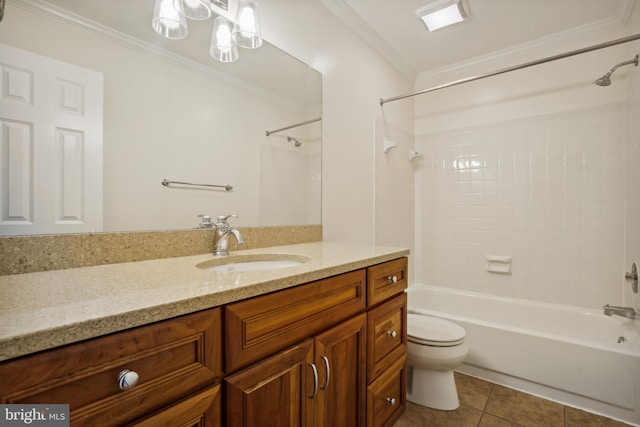 full bathroom featuring toilet, ornamental molding, vanity, tub / shower combination, and tile patterned floors