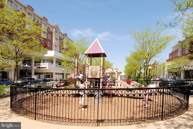 community jungle gym with fence