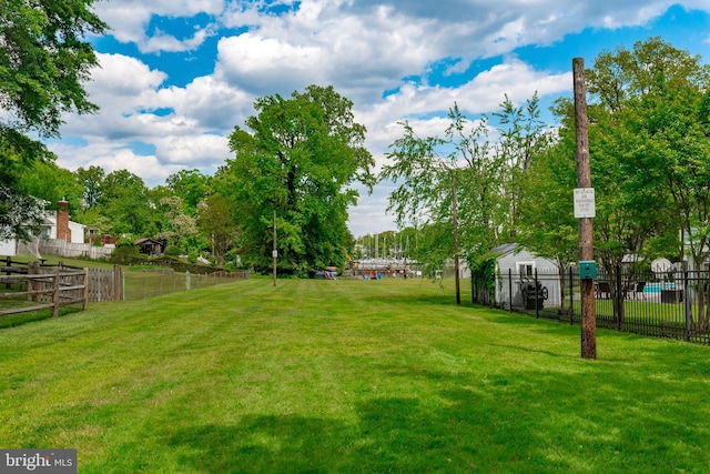 view of yard with fence