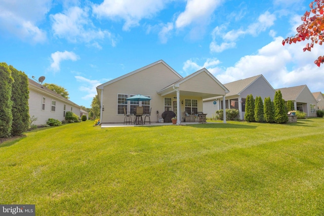 29 Embassy, Woolwich Twp, NJ 08085 - rear view of house featuring a patio and a lawn