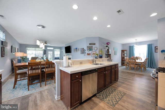 29 Embassy, Woolwich Twp, NJ 08085 - kitchen with appliances with stainless steel finishes, open floor plan, light countertops, wood finished floors, and recessed lighting
