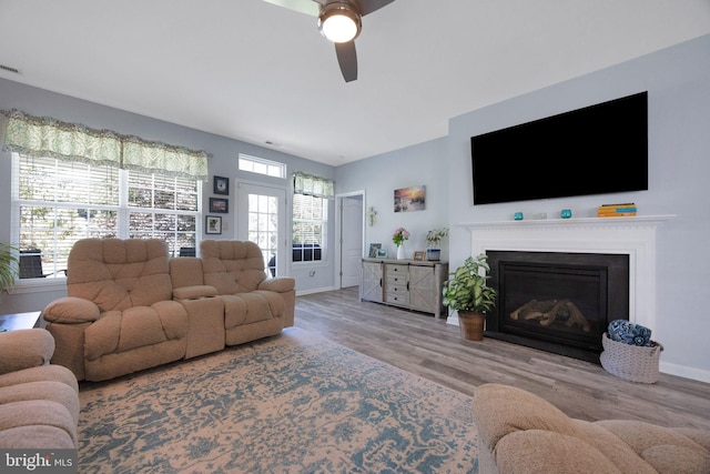 29 Embassy, Woolwich Twp, NJ 08085 - living area featuring ceiling fan, wood finished floors, and a fireplace
