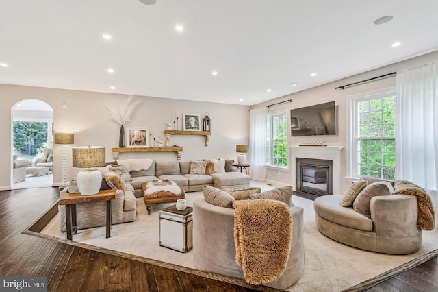 630 Good Shepherd Way, Owings, MD 20736 - living room with wood-type flooring, a glass covered fireplace, and recessed lighting