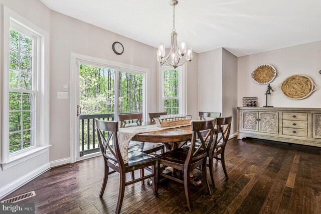 630 Good Shepherd Way, Owings, MD 20736 - dining room featuring baseboards, visible vents, dark wood-style floors, and an inviting chandelier