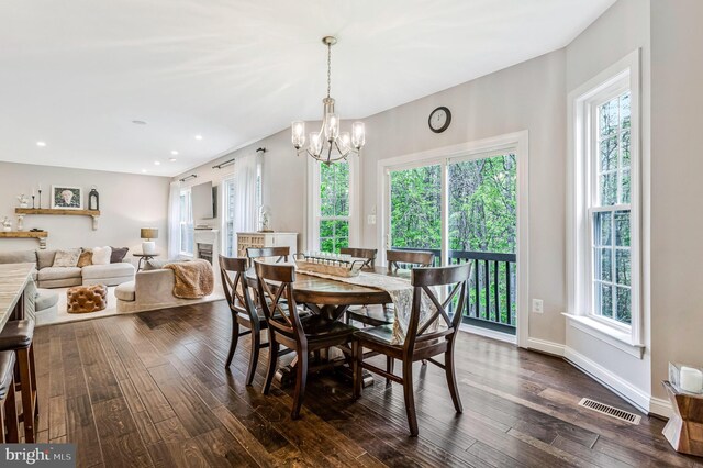 630 Good Shepherd Way, Owings, MD 20736 - dining space featuring a chandelier, dark wood-type flooring, visible vents, and plenty of natural light