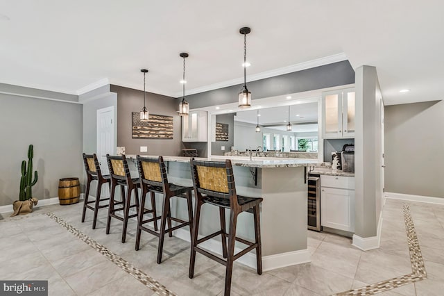 630 Good Shepherd Way, Owings, MD 20736 - kitchen with a kitchen bar, glass insert cabinets, baseboards, and white cabinetry