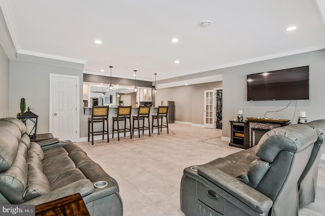 630 Good Shepherd Way, Owings, MD 20736 - living area featuring baseboards, ornamental molding, and recessed lighting
