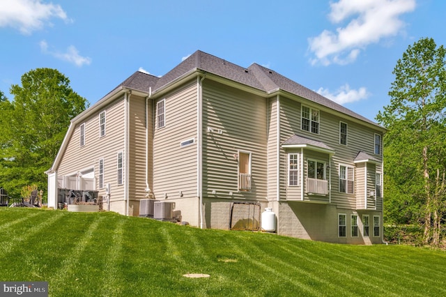 630 Good Shepherd Way, Owings, MD 20736 - back of house featuring a yard and central air condition unit