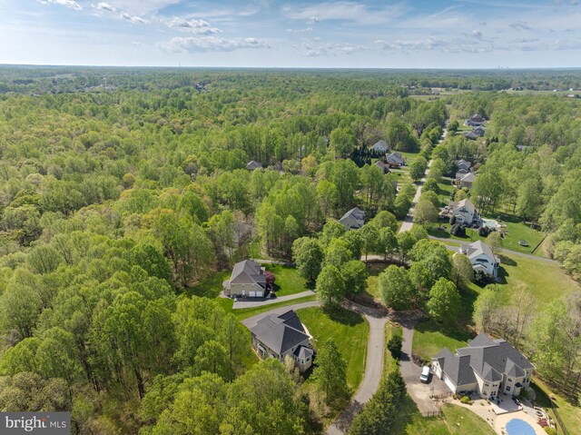 630 Good Shepherd Way, Owings, MD 20736 - aerial view featuring a wooded view