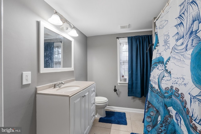 full bath with vanity, baseboards, tile patterned flooring, toilet, and visible vents