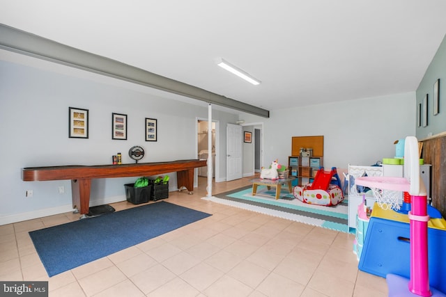 game room featuring baseboards