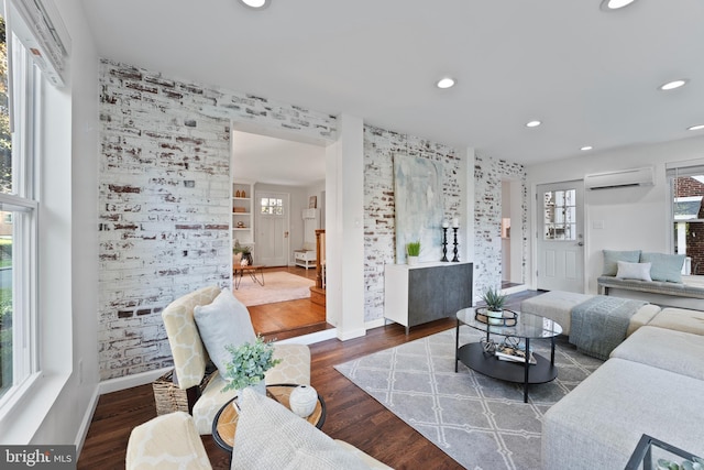 9301 Mintwood St, Silver Spring, MD 20901 - living area featuring an AC wall unit, recessed lighting, baseboards, and a wealth of natural light