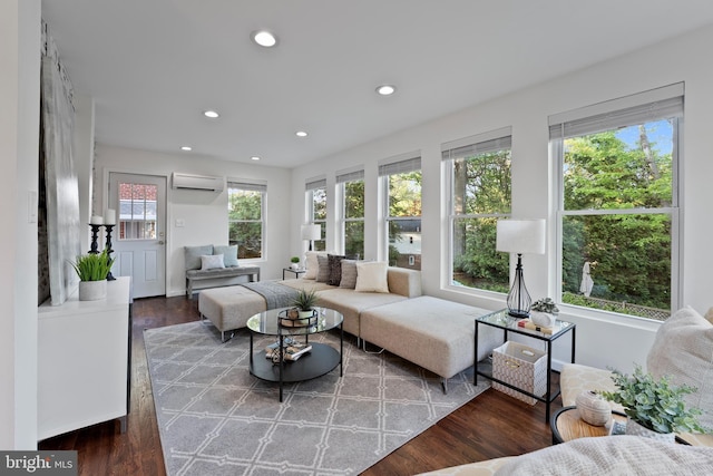 9301 Mintwood St, Silver Spring, MD 20901 - living area featuring recessed lighting, wood finished floors, and a wall mounted air conditioner