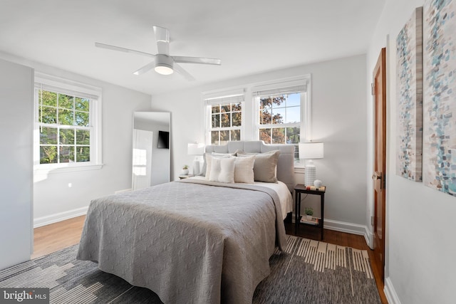 9301 Mintwood St, Silver Spring, MD 20901 - bedroom with baseboards, a ceiling fan, and wood finished floors