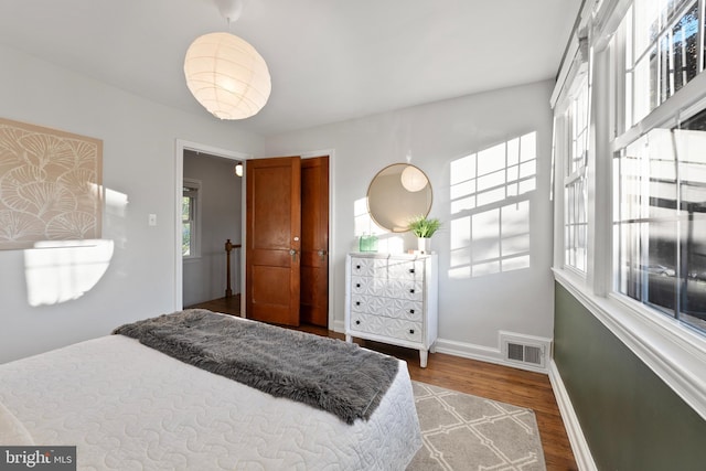 9301 Mintwood St, Silver Spring, MD 20901 - bedroom featuring visible vents, baseboards, and wood finished floors