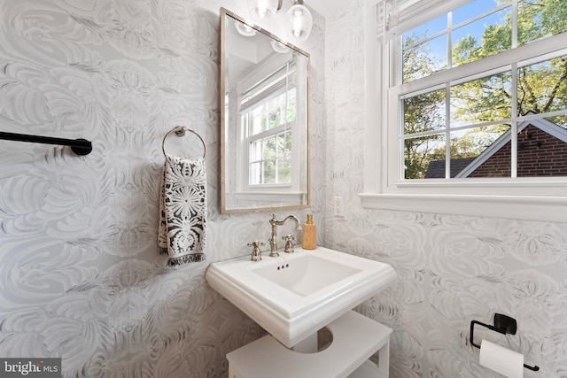 9301 Mintwood St, Silver Spring, MD 20901 - bathroom featuring a sink and wallpapered walls