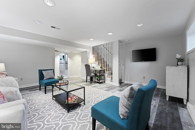 9301 Mintwood St, Silver Spring, MD 20901 - living area featuring visible vents, stairs, wood finished floors, baseboards, and recessed lighting