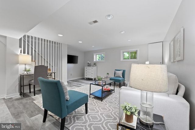 9301 Mintwood St, Silver Spring, MD 20901 - living room featuring recessed lighting, baseboards, wood finished floors, visible vents, and stairway
