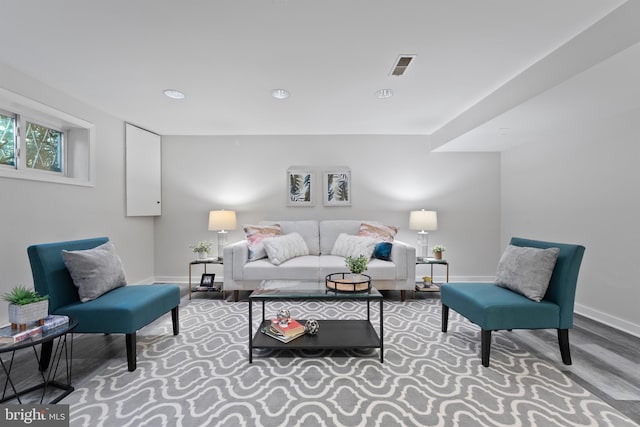 9301 Mintwood St, Silver Spring, MD 20901 - living area featuring baseboards, recessed lighting, wood finished floors, and visible vents