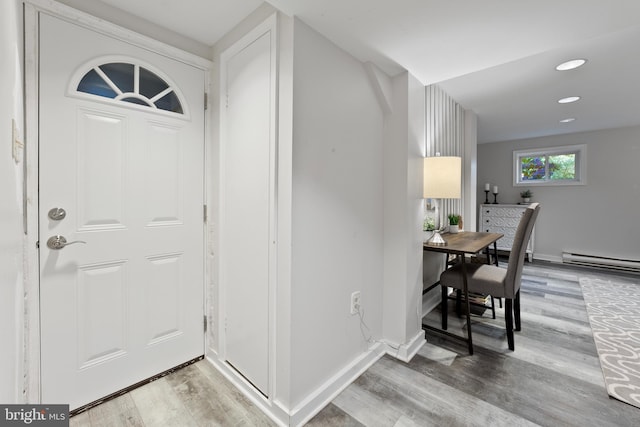 9301 Mintwood St, Silver Spring, MD 20901 - foyer with recessed lighting, a baseboard radiator, light wood finished floors, and baseboards