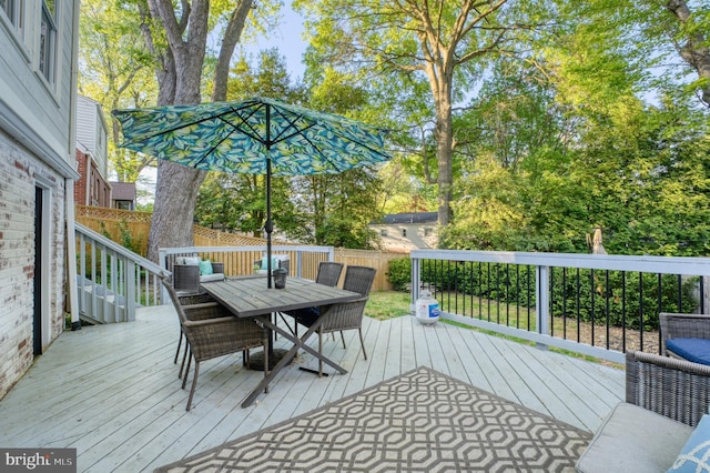 9301 Mintwood St, Silver Spring, MD 20901 - wooden terrace with a fenced backyard and outdoor dining space